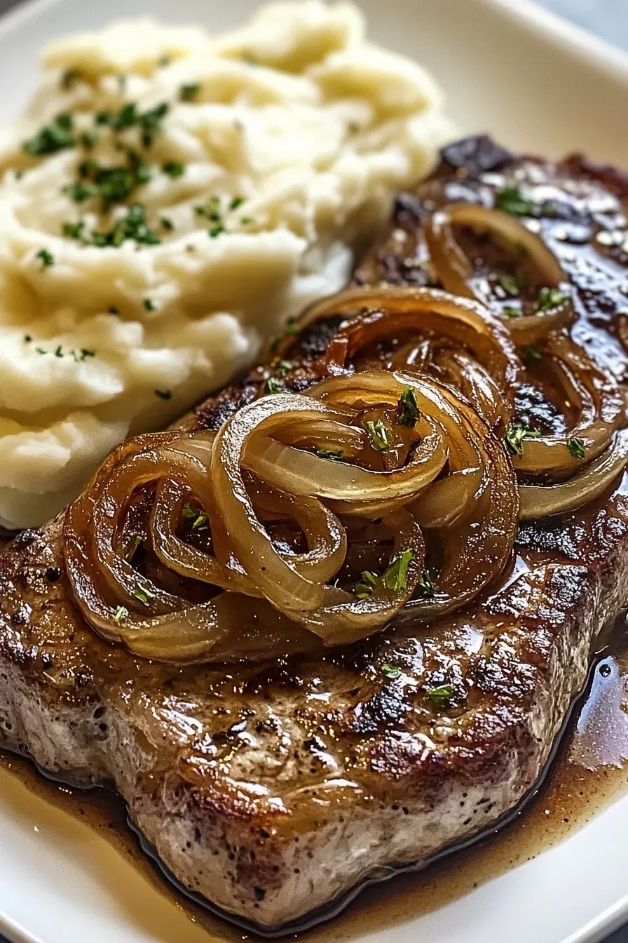 Ribeye Steak with Caramelized Onions and Mashed Potatoes